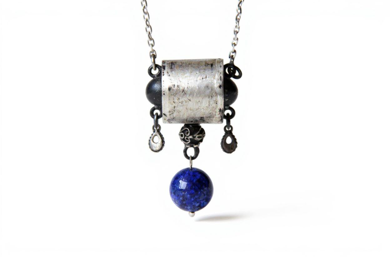 Silver and lapis lazuli necklace featuring ancient Persian design elements