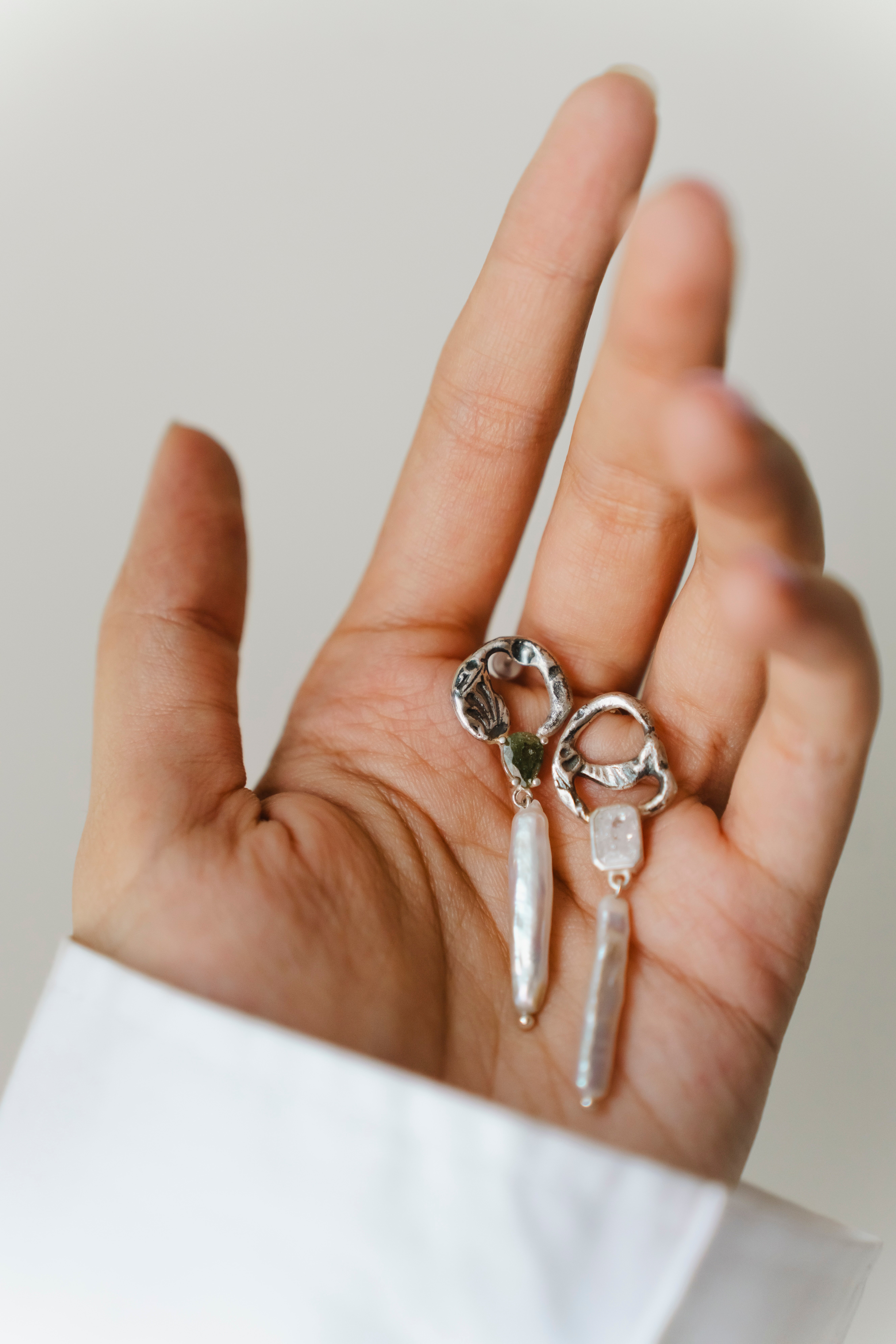 Organic forms and brilliant colors in Pre-meditated Coincidences jewelry