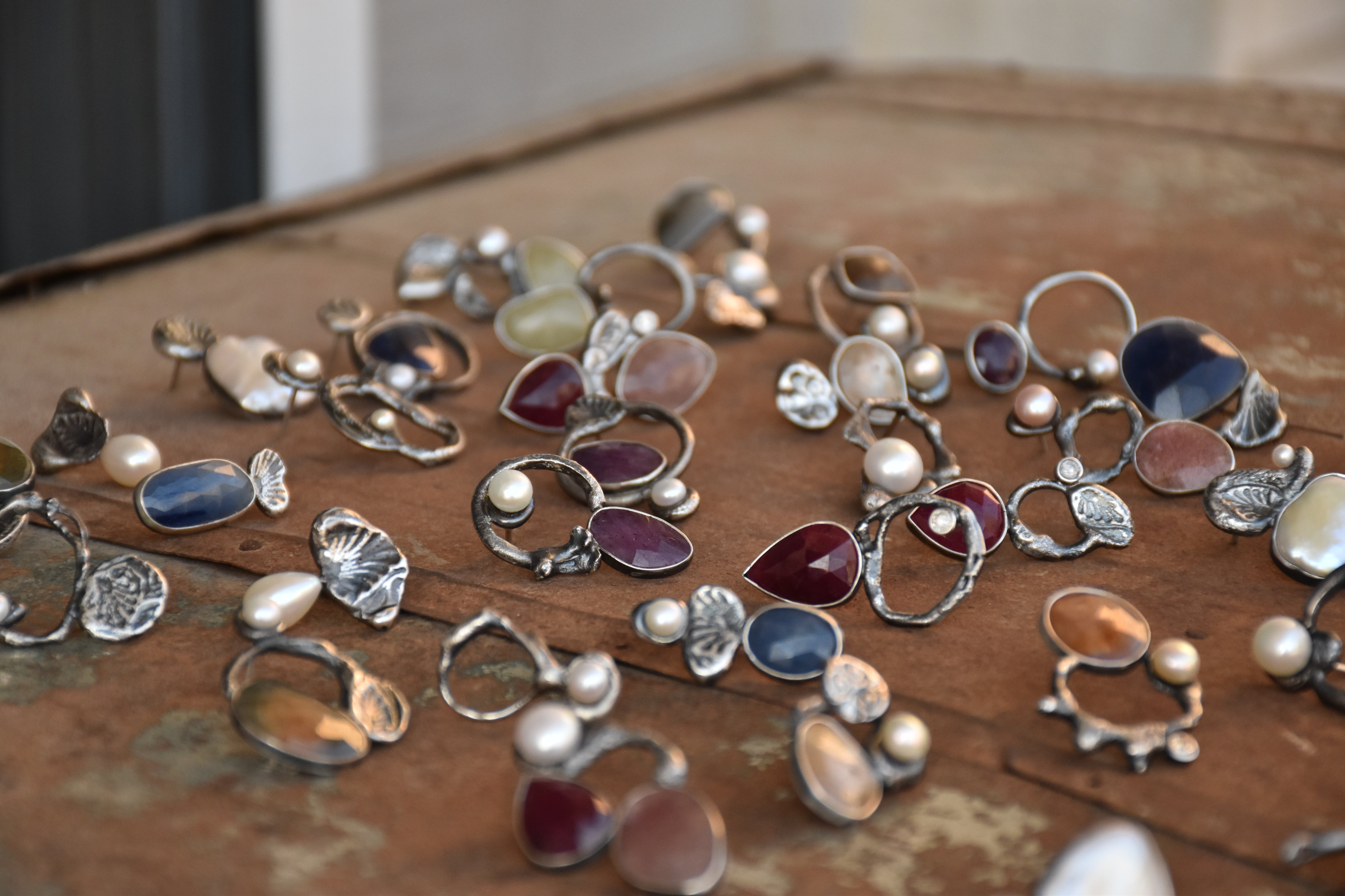 Pre-meditated Coincidences - improvisational jewelry collection with 100+ single earrings